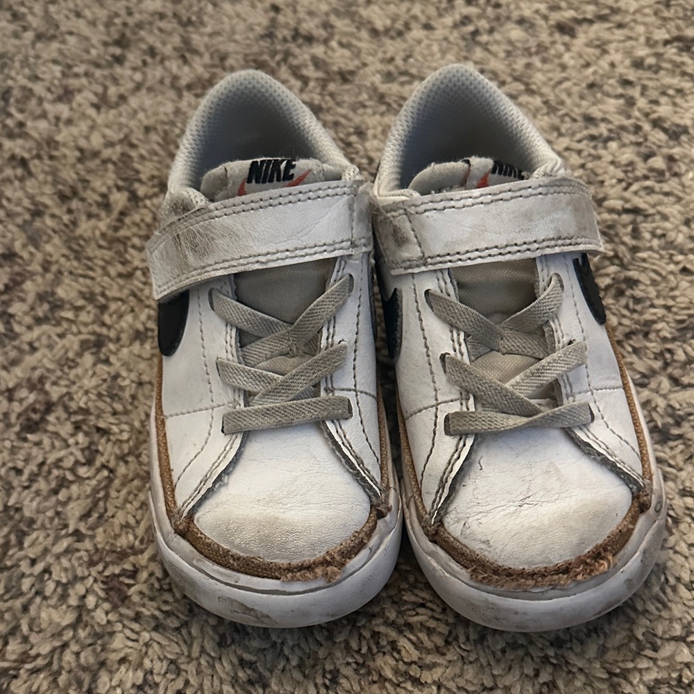 Nike Kids White Sneakers with Black Swoosh and Brown Trim